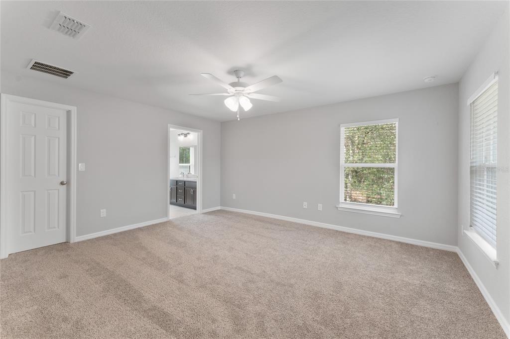 9461 North Sandree Drive Citrus Springs, FL 34434 - Photo 17 of 50 a view of an empty room with a window