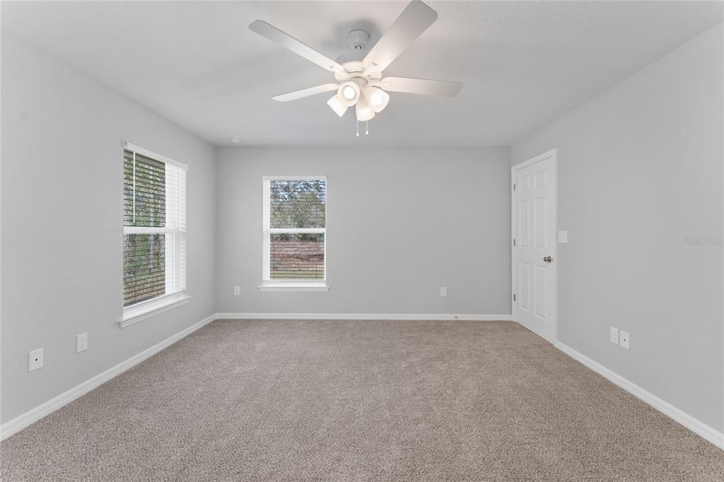 9461 North Sandree Drive Citrus Springs, FL 34434 - Photo 19 of 50 a view of an empty room with a window