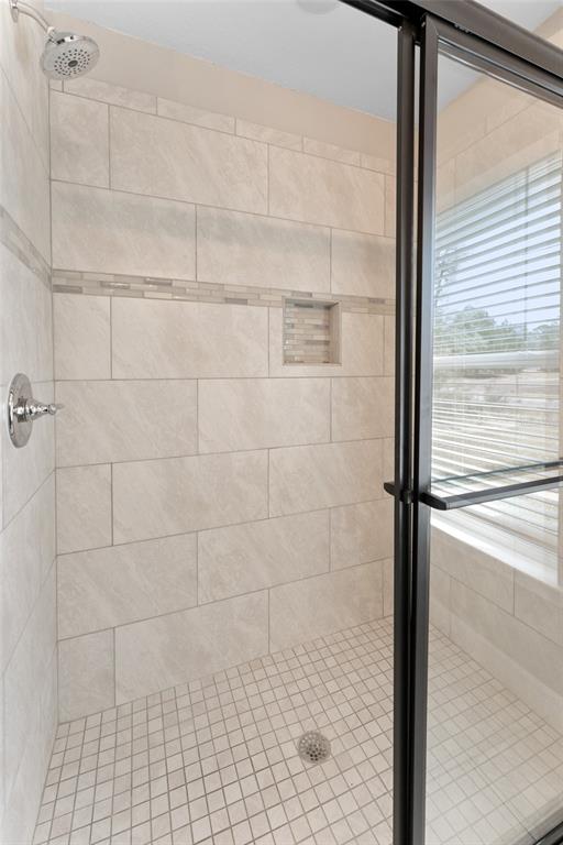 9461 North Sandree Drive Citrus Springs, FL 34434 - Photo 22 of 50 a bathroom with a shower