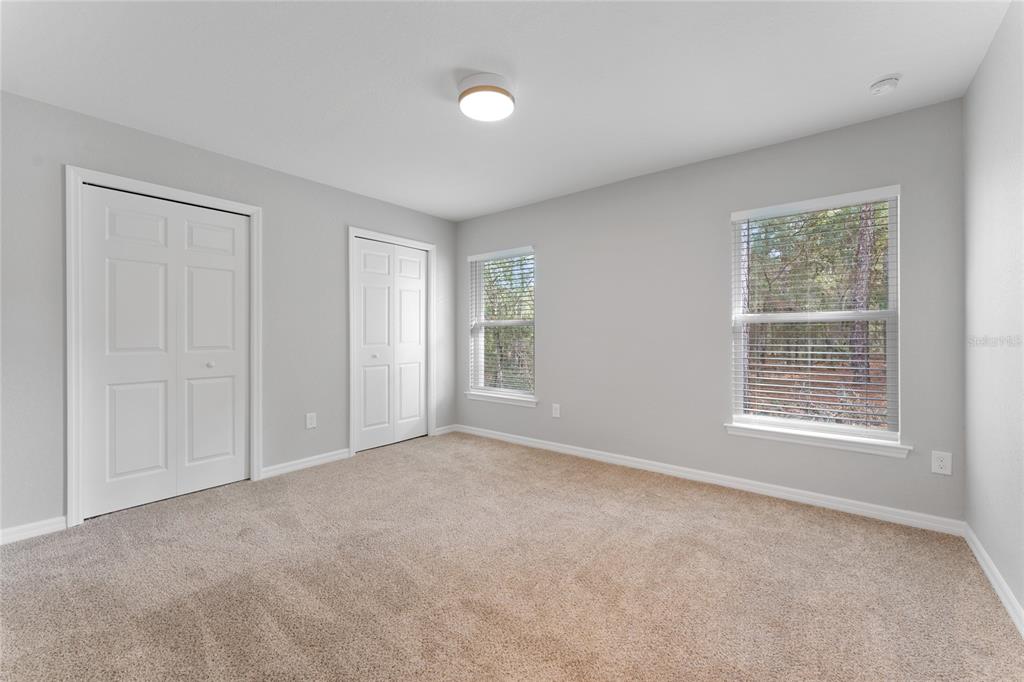 9461 North Sandree Drive Citrus Springs, FL 34434 - Photo 26 of 50 a view of an empty room with a window