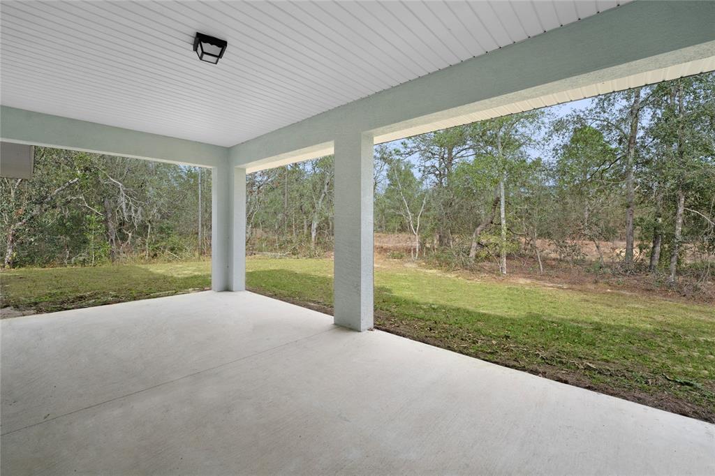 9461 North Sandree Drive Citrus Springs, FL 34434 - Photo 37 of 50 a view of a room with yard and mountain view
