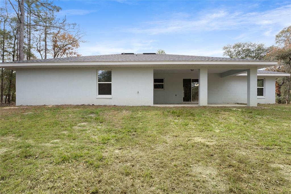 9461 North Sandree Drive Citrus Springs, FL 34434 - Photo 42 of 50 a house with yard