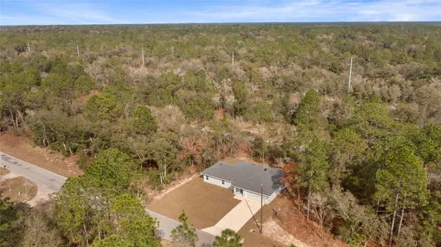 a view of a yard with an ocean