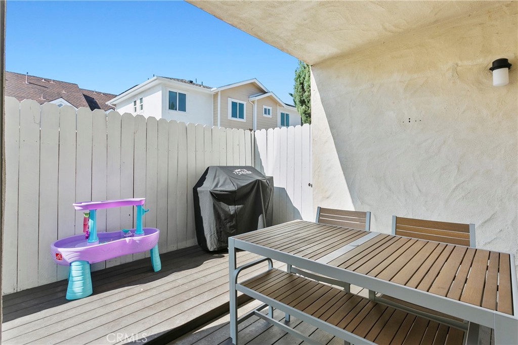 2575 Elden Avenue, Unit 2 Costa Mesa, CA 92627 - Photo 11 of 12 a bedroom with a bed and a dresser