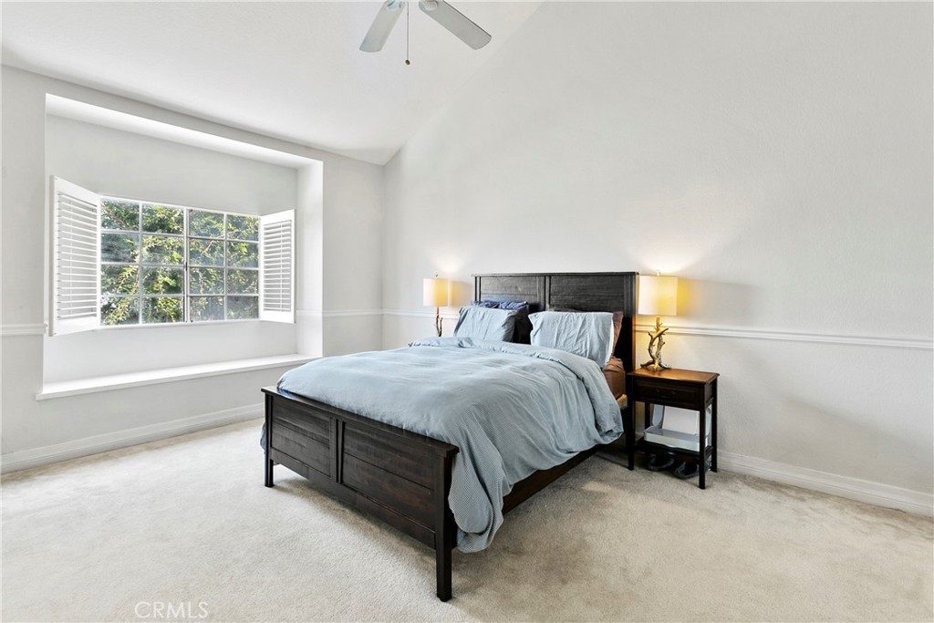 2575 Elden Avenue, Unit 2 Costa Mesa, CA 92627 - Photo 7 of 12 a bedroom with a bed and window