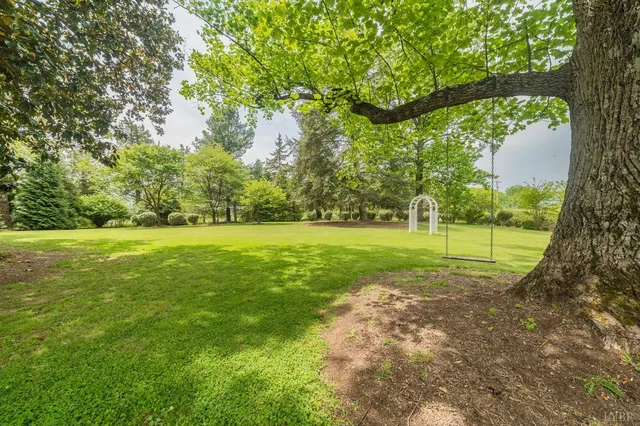 a view of a livingroom with furniture and wooden floor