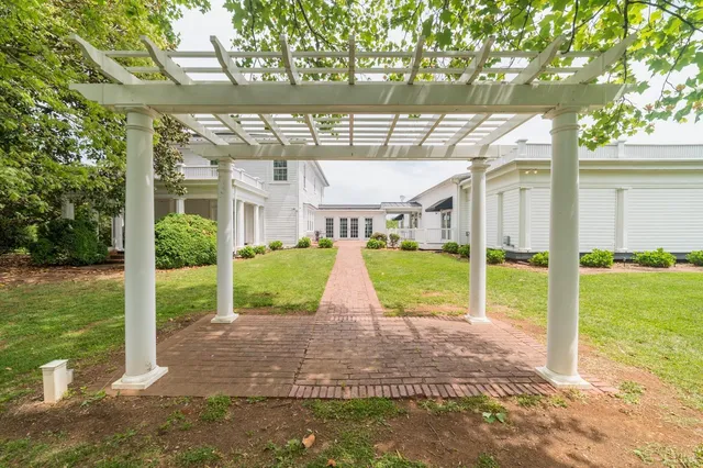 a view of livingroom and dining room with wooden floor