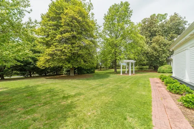 a view of livingroom with furniture wooden floor and window