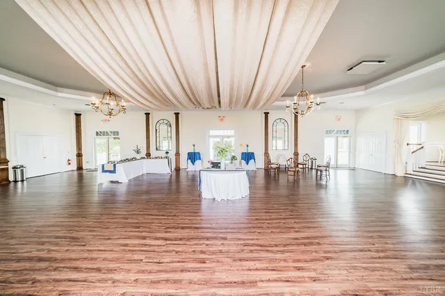 a bedroom with furniture and a fireplace