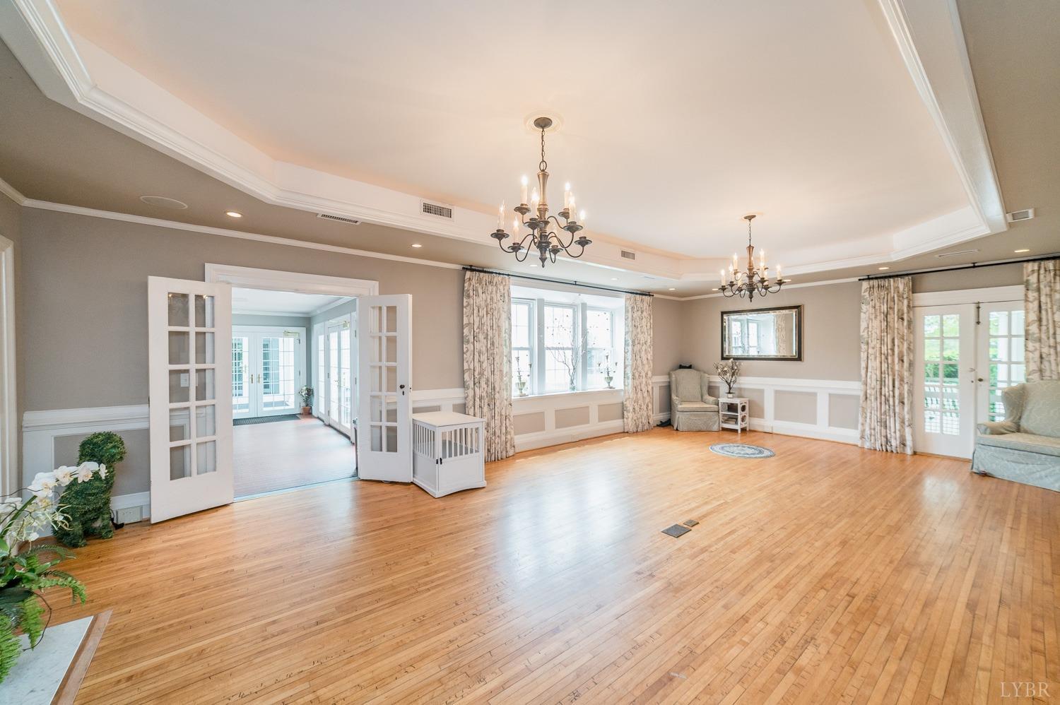 7821 Bellevue Road Goode, VA 24556 - Photo 51 of 78 a view of an empty room with wooden floor and a window