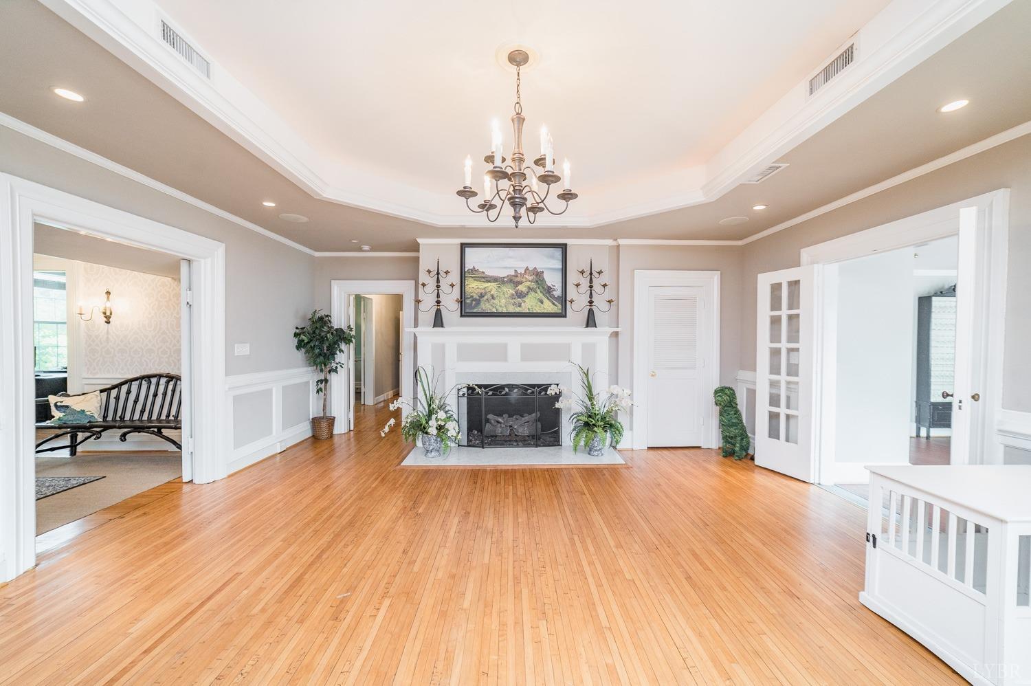 7821 Bellevue Road Goode, VA 24556 - Photo 52 of 78 a living room with furniture and a fireplace