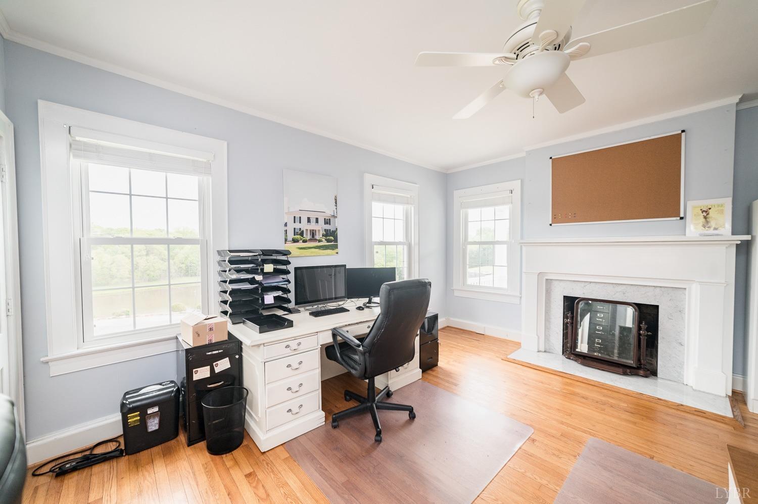 7821 Bellevue Road Goode, VA 24556 - Photo 62 of 78 a view of a livingroom with workspace and a window