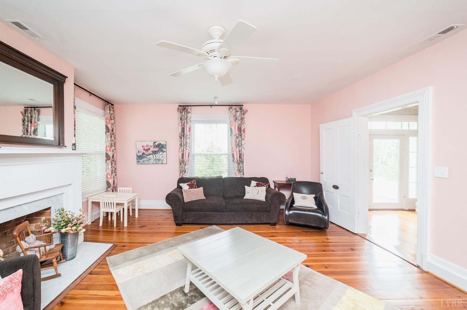 7821 Bellevue Road Goode, VA 24556 - Photo 69 of 78 a living room with furniture and a wooden floor