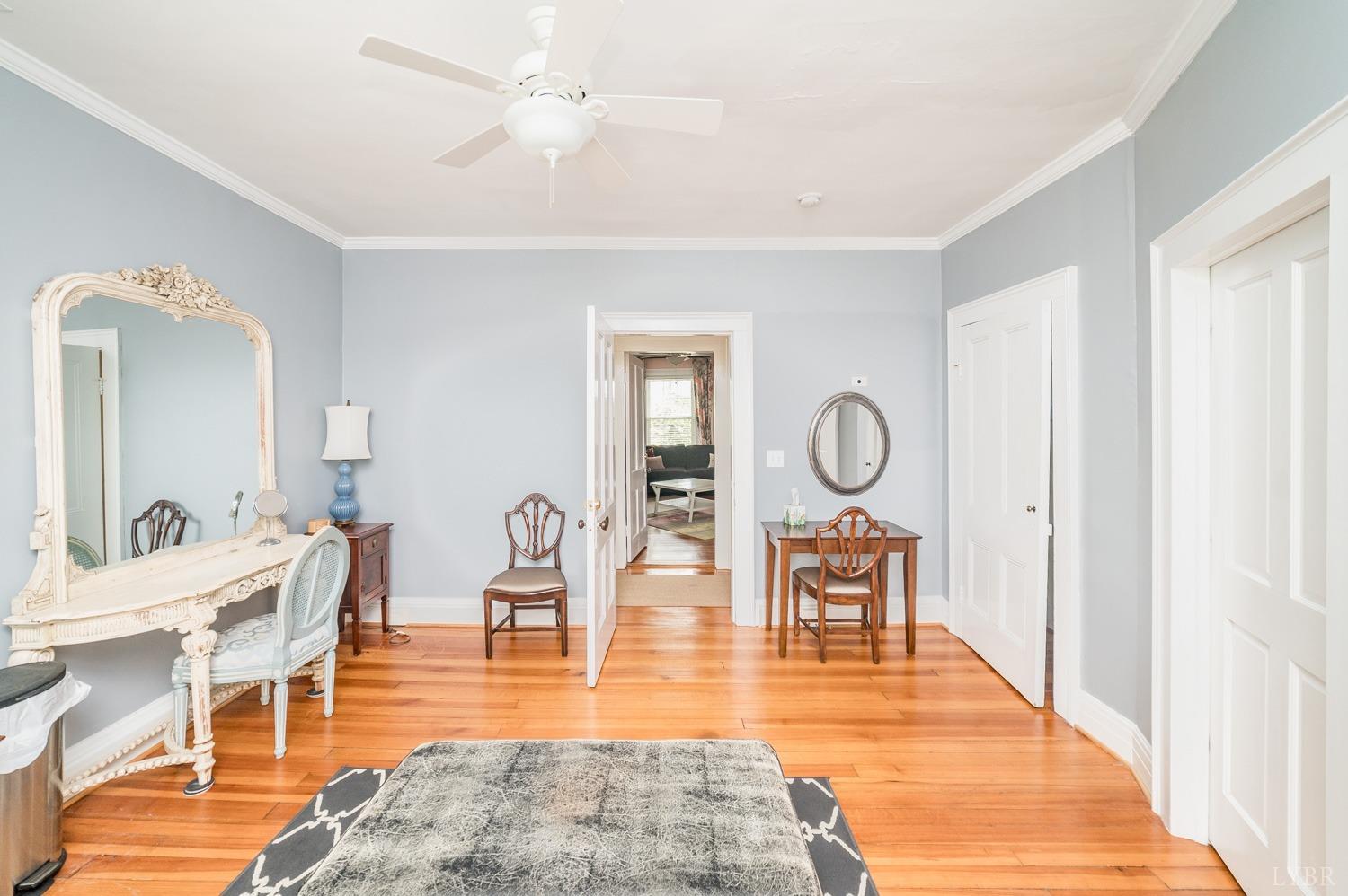 7821 Bellevue Road Goode, VA 24556 - Photo 70 of 78 a living room with furniture a table and chairs