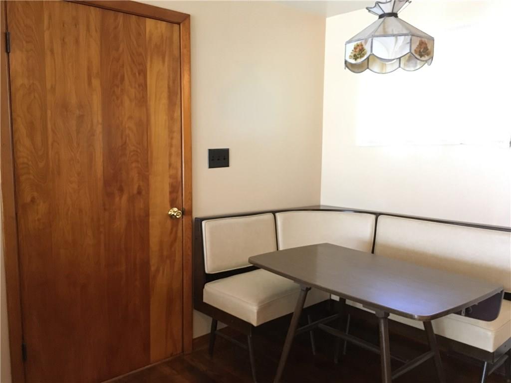 135 Economy Grade Road Coraopolis, PA 15108 - Photo 9 of 21 Breakfast Nook with Corner seating and table. Access to Family Room and rear deck.