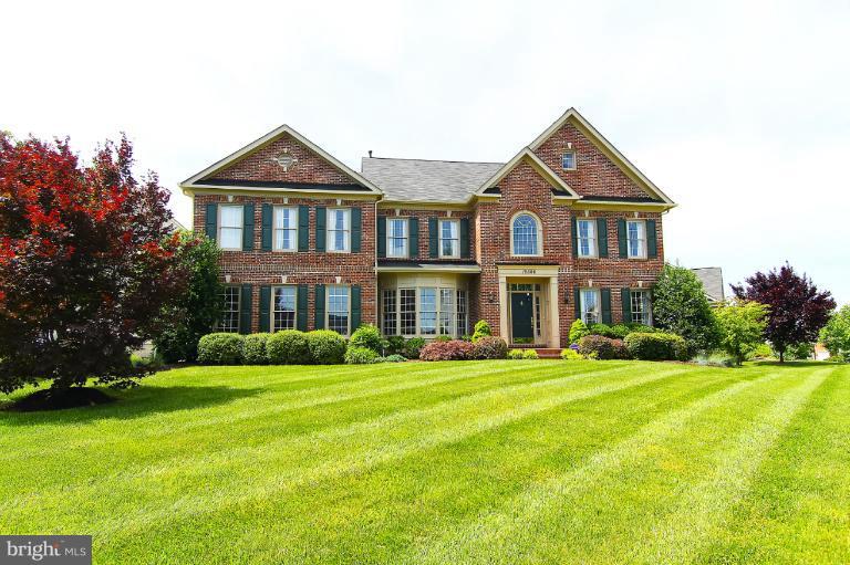 18506 Thundercloud Road Boyds, MD 20841 - Photo 1 of 17 a front view of a house with a yard