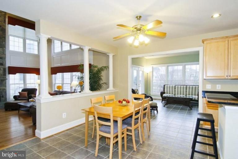 18506 Thundercloud Road Boyds, MD 20841 - Photo 9 of 17 a dining room with furniture and wooden floor