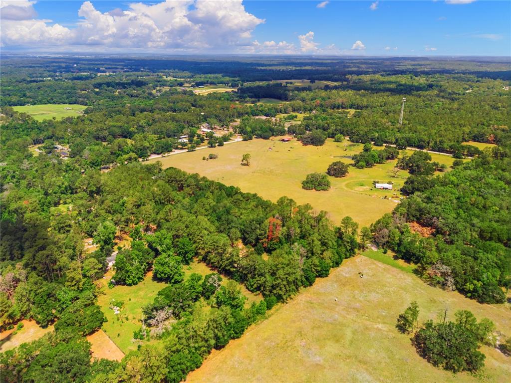 1074 Culbreath Road Brooksville, FL 34602 - Photo 19 of 20 a view of a lake from a yard