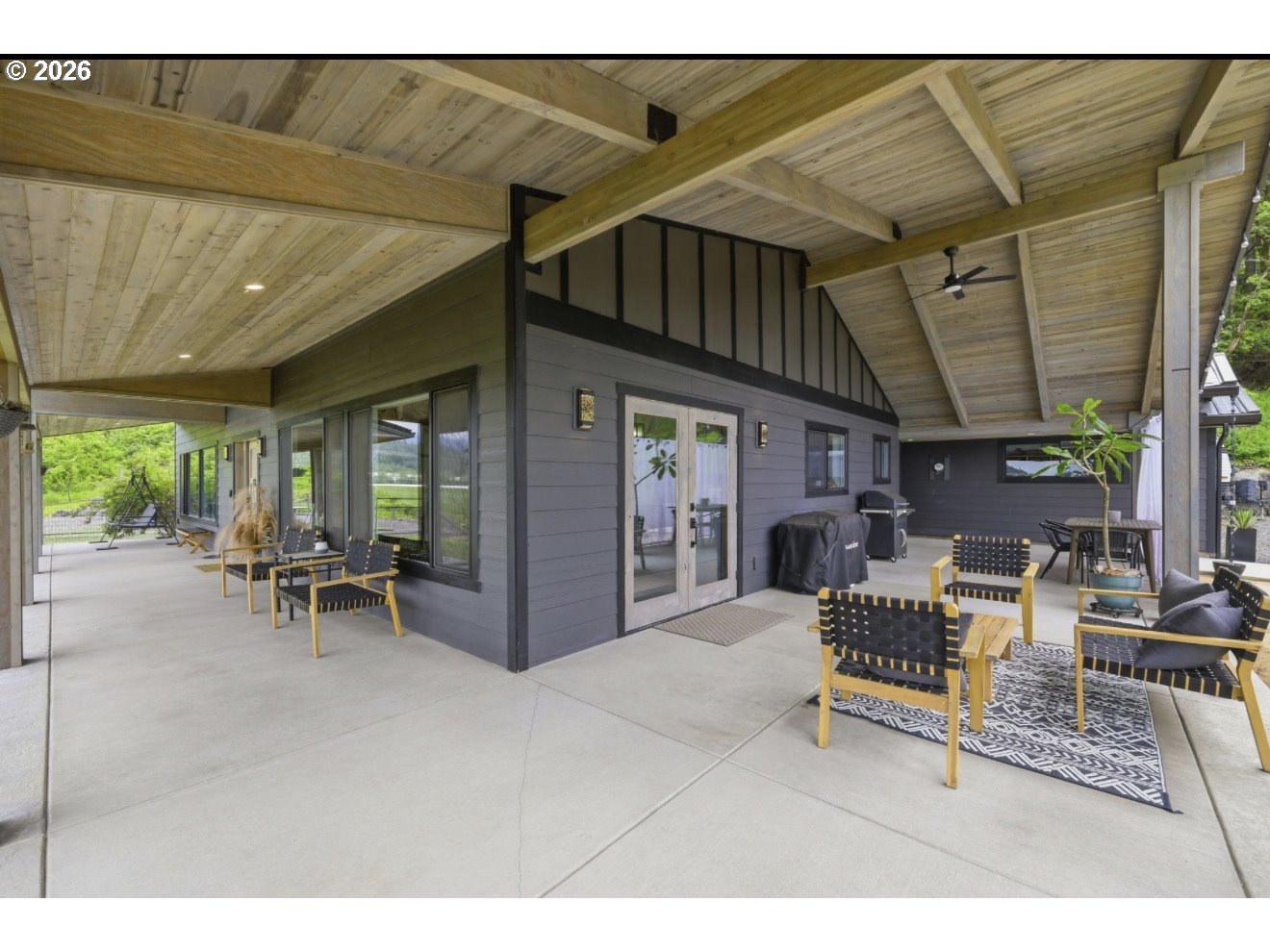 33192 Wilkins Road Eugene, OR 97408 - Photo 6 of 35 a view of a patio with a table and chairs