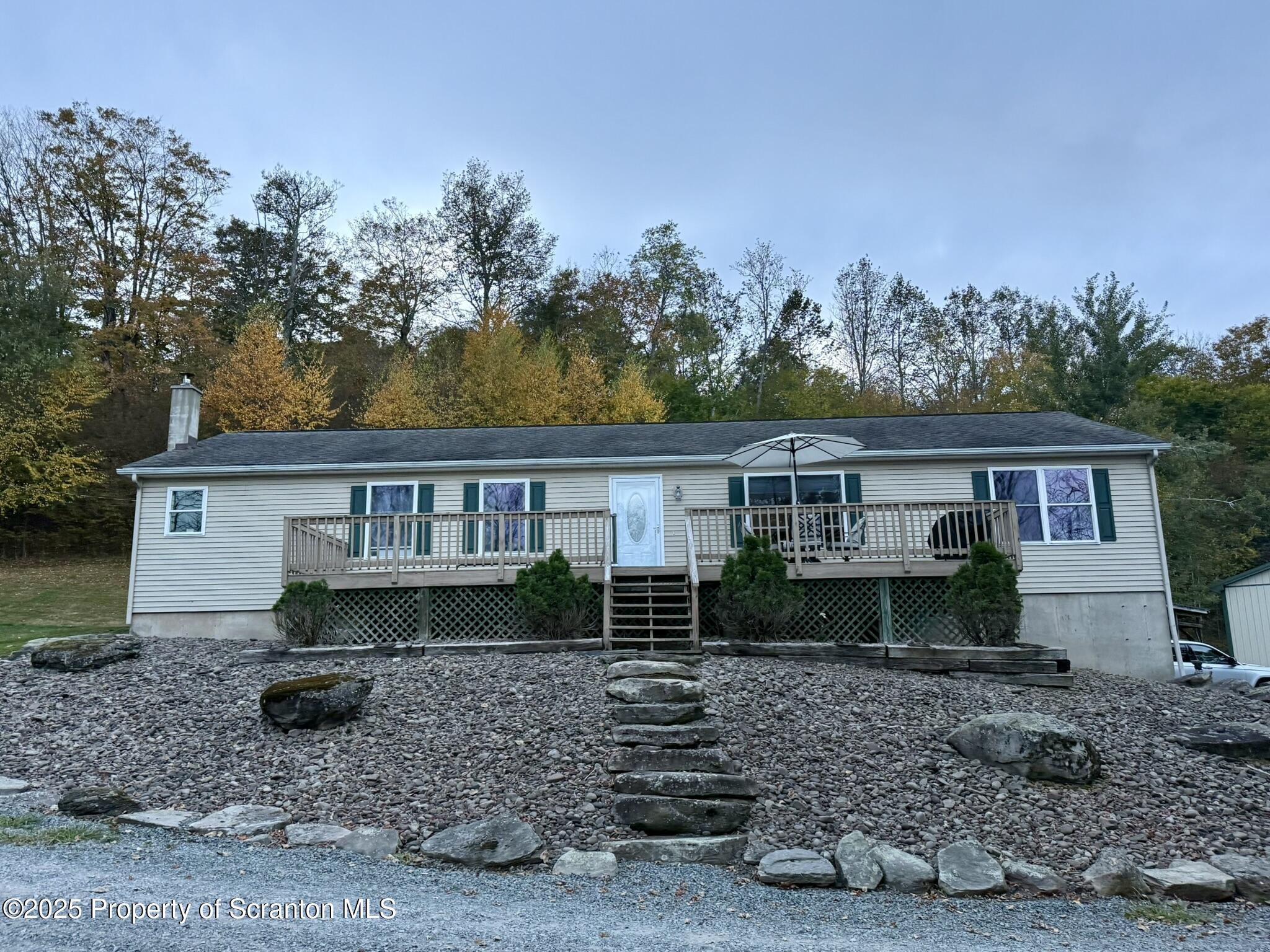 44 Franks Old Road Pleasant Mount, PA 18453 - Photo 1 of 37 front view of a house with a yard