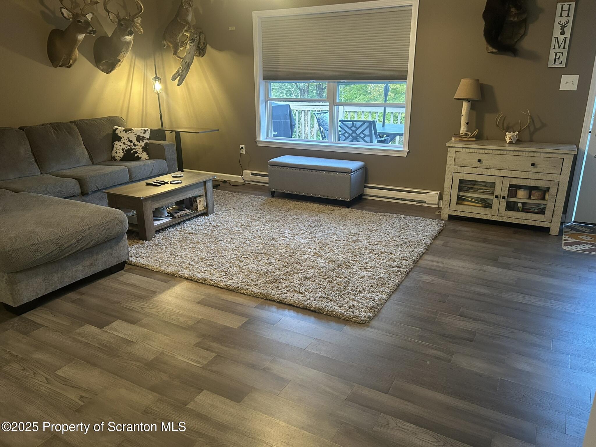 44 Franks Old Road Pleasant Mount, PA 18453 - Photo 19 of 37 a living room with furniture and a window