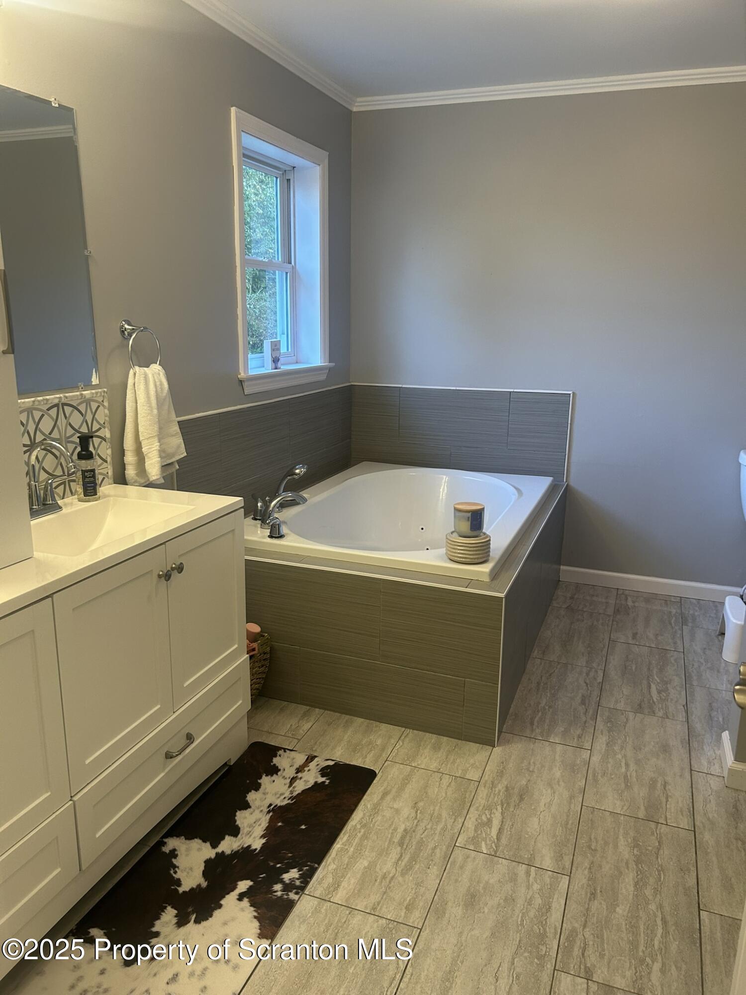 44 Franks Old Road Pleasant Mount, PA 18453 - Photo 21 of 37 a room with a washing machine and sink