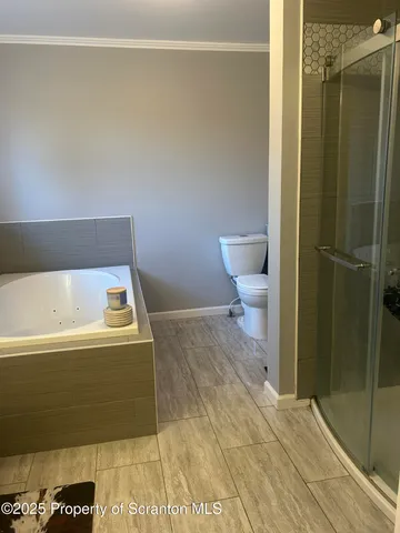 a view of a house with a yard and garage