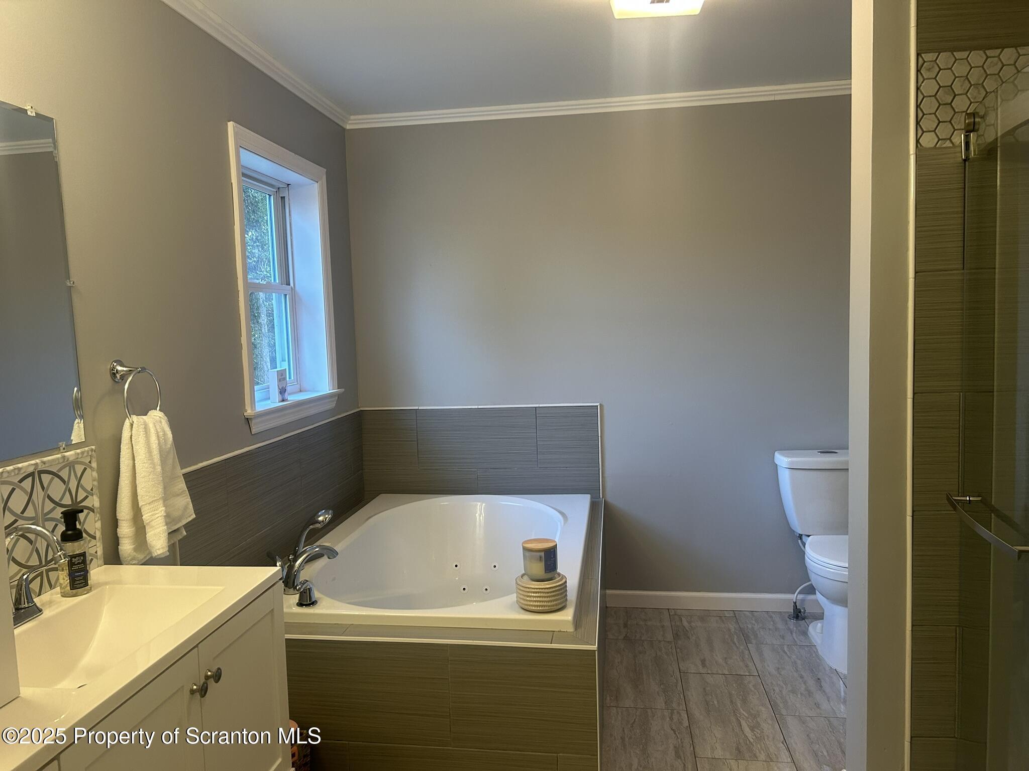 44 Franks Old Road Pleasant Mount, PA 18453 - Photo 23 of 37 a bathroom with a sink and a vanity