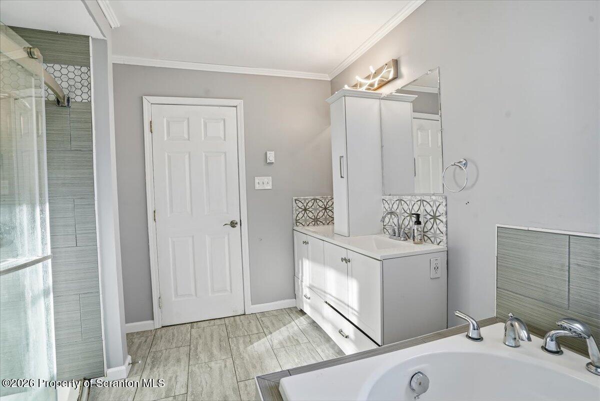 44 Franks Old Road Pleasant Mount, PA 18453 - Photo 23 of 49 a bathroom with a sink a toilet and shower