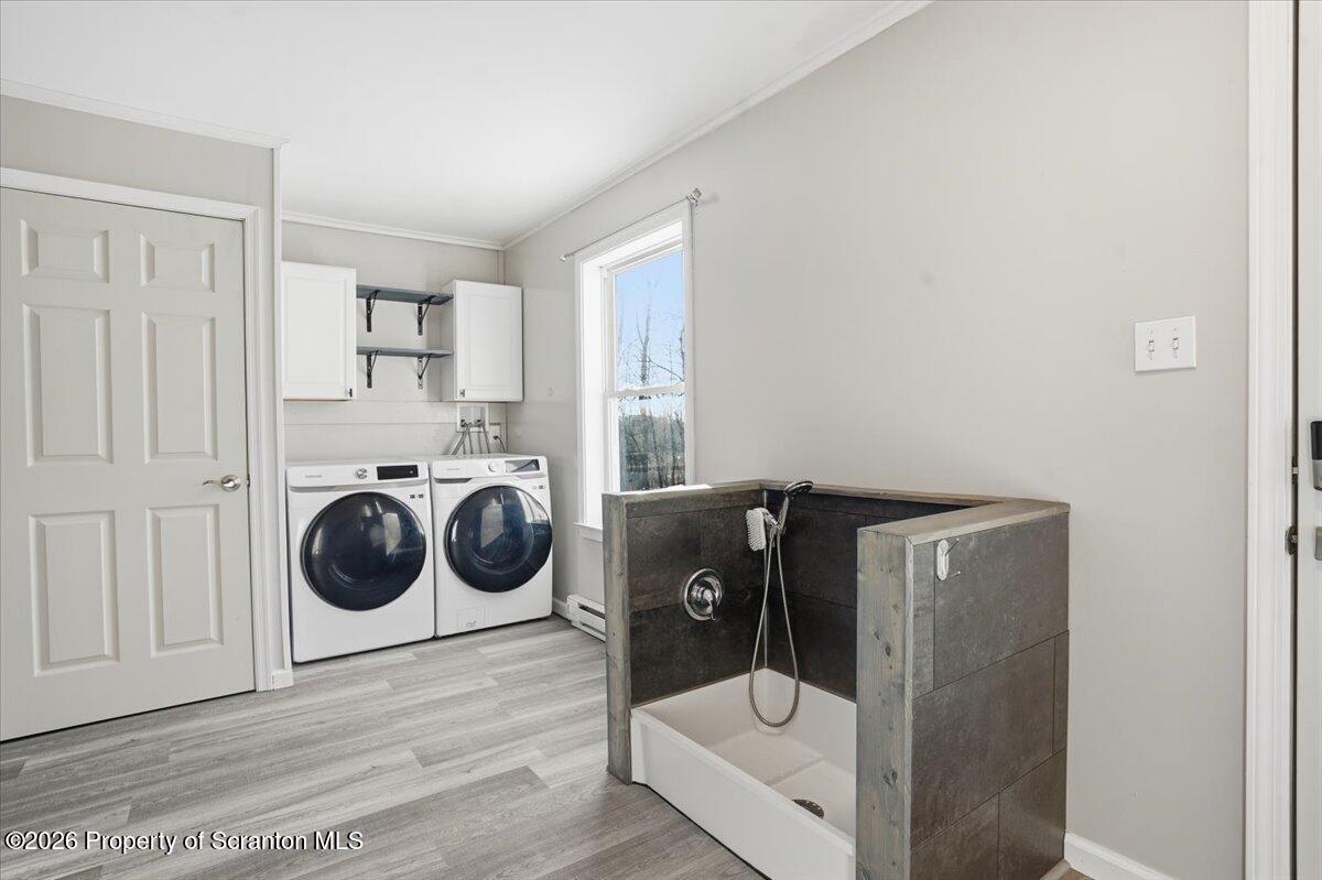 44 Franks Old Road Pleasant Mount, PA 18453 - Photo 29 of 49 a utility room with dryer and washer