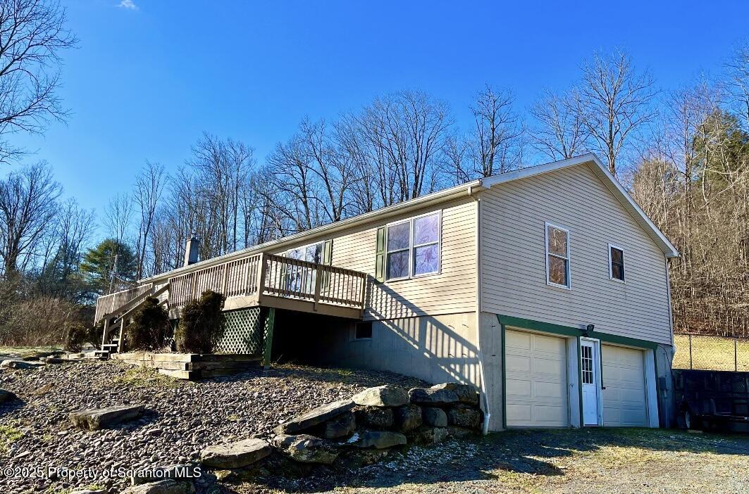 44 Franks Old Road Pleasant Mount, PA 18453 - Photo 3 of 37 a house view with a backyard space