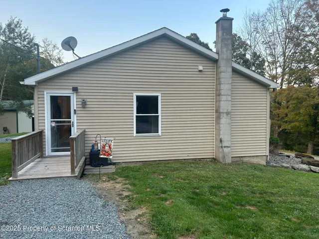 a view of a lake with a big yard