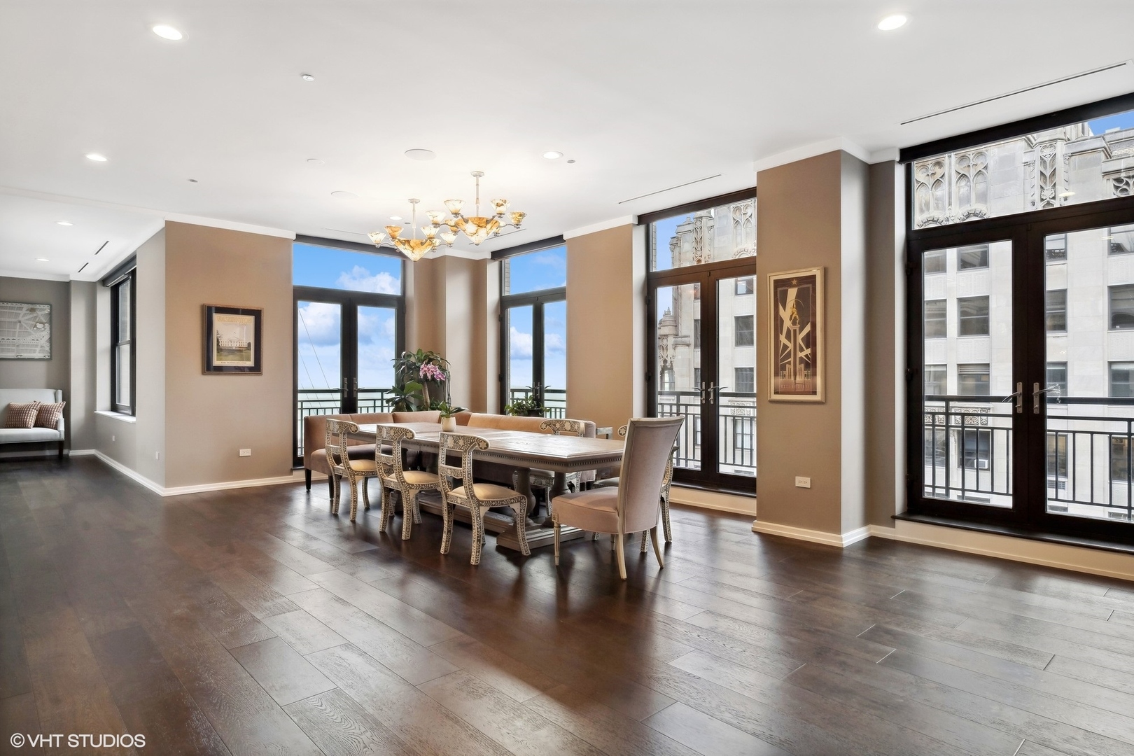 6 North Michigan Avenue, Unit 1901 Chicago, IL 60602 - Photo 20 of 54 a view of a dining room with furniture window and wooden floor
