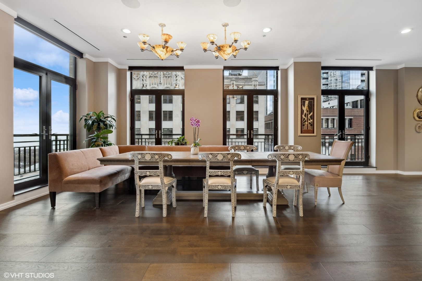 6 North Michigan Avenue, Unit 1901 Chicago, IL 60602 - Photo 21 of 54 a view of a dining room with furniture window and wooden floor