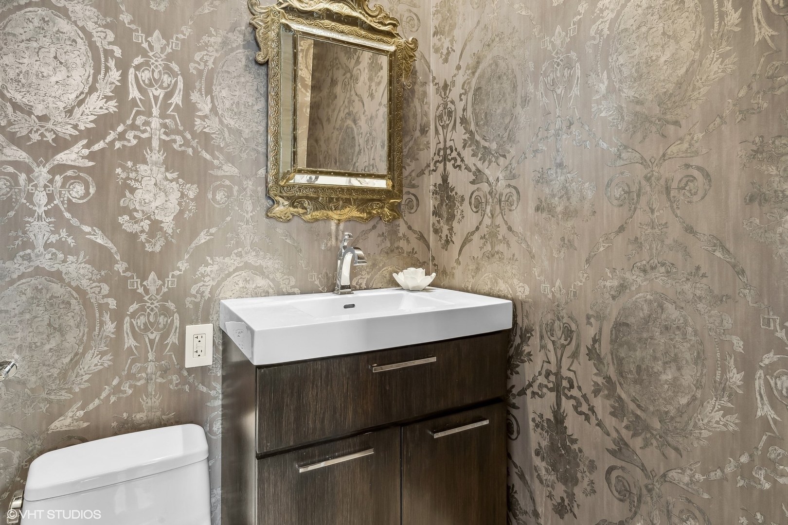 6 North Michigan Avenue, Unit 1901 Chicago, IL 60602 - Photo 34 of 54 a bathroom with a sink and a toilet