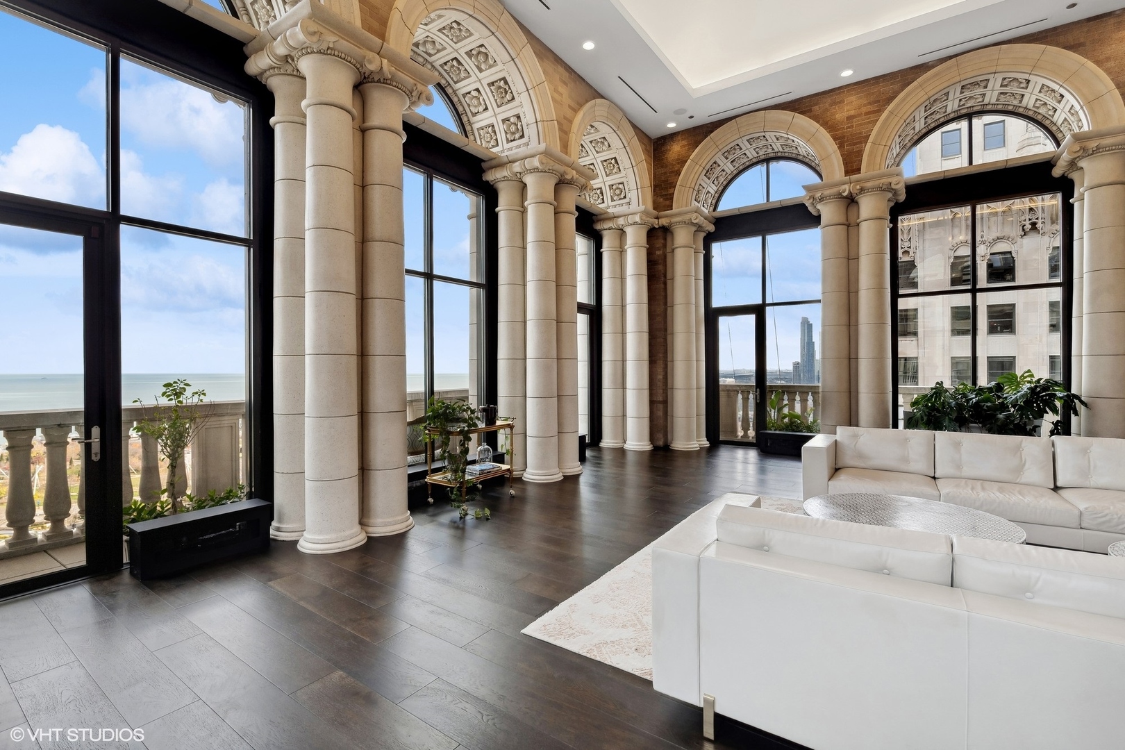 6 North Michigan Avenue, Unit 1901 Chicago, IL 60602 - Photo 5 of 54 a lobby with furniture and floor to ceiling window