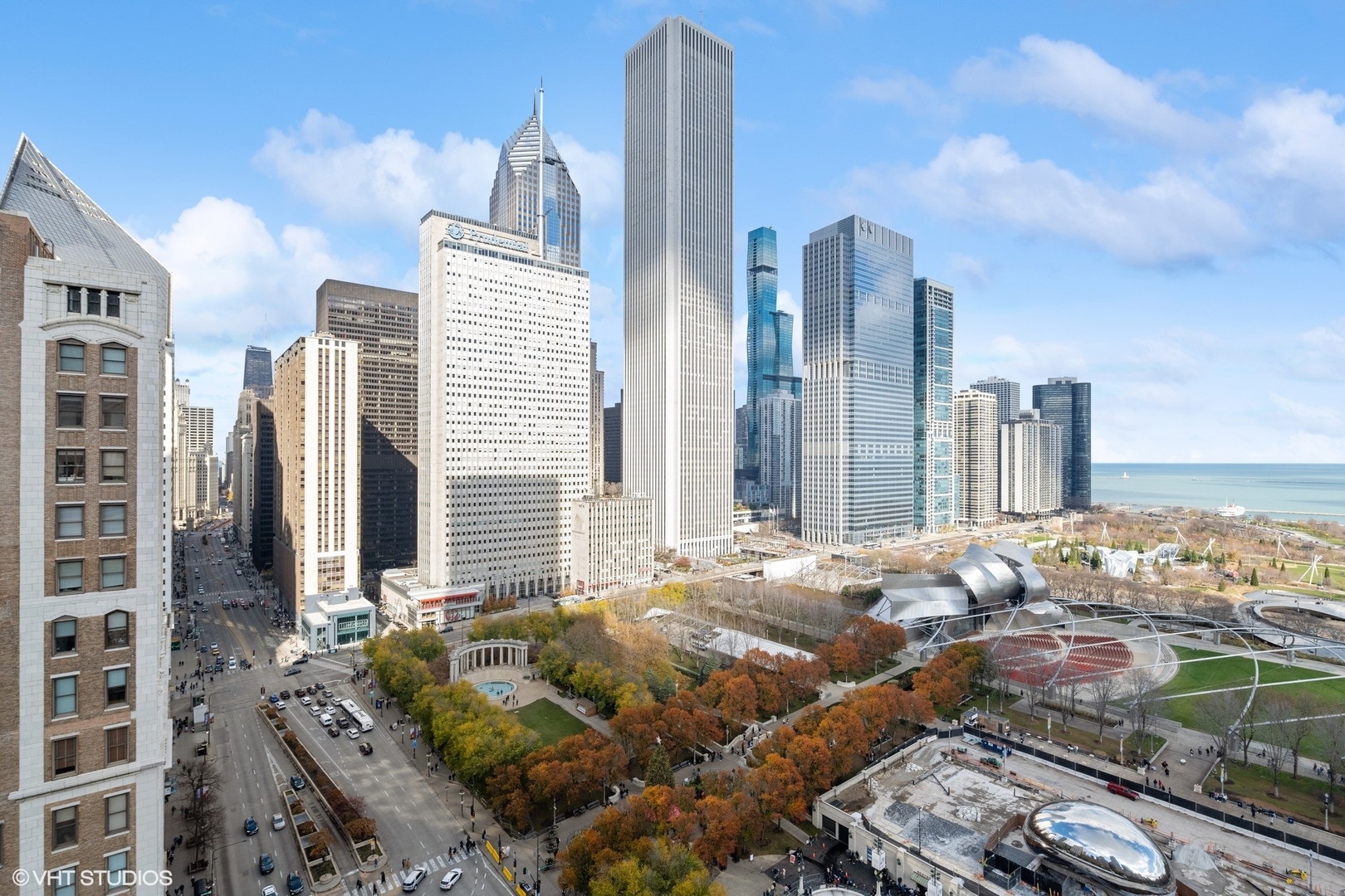 6 North Michigan Avenue, Unit 1901 Chicago, IL 60602 - Photo 7 of 54 a view of a city with tall buildings
