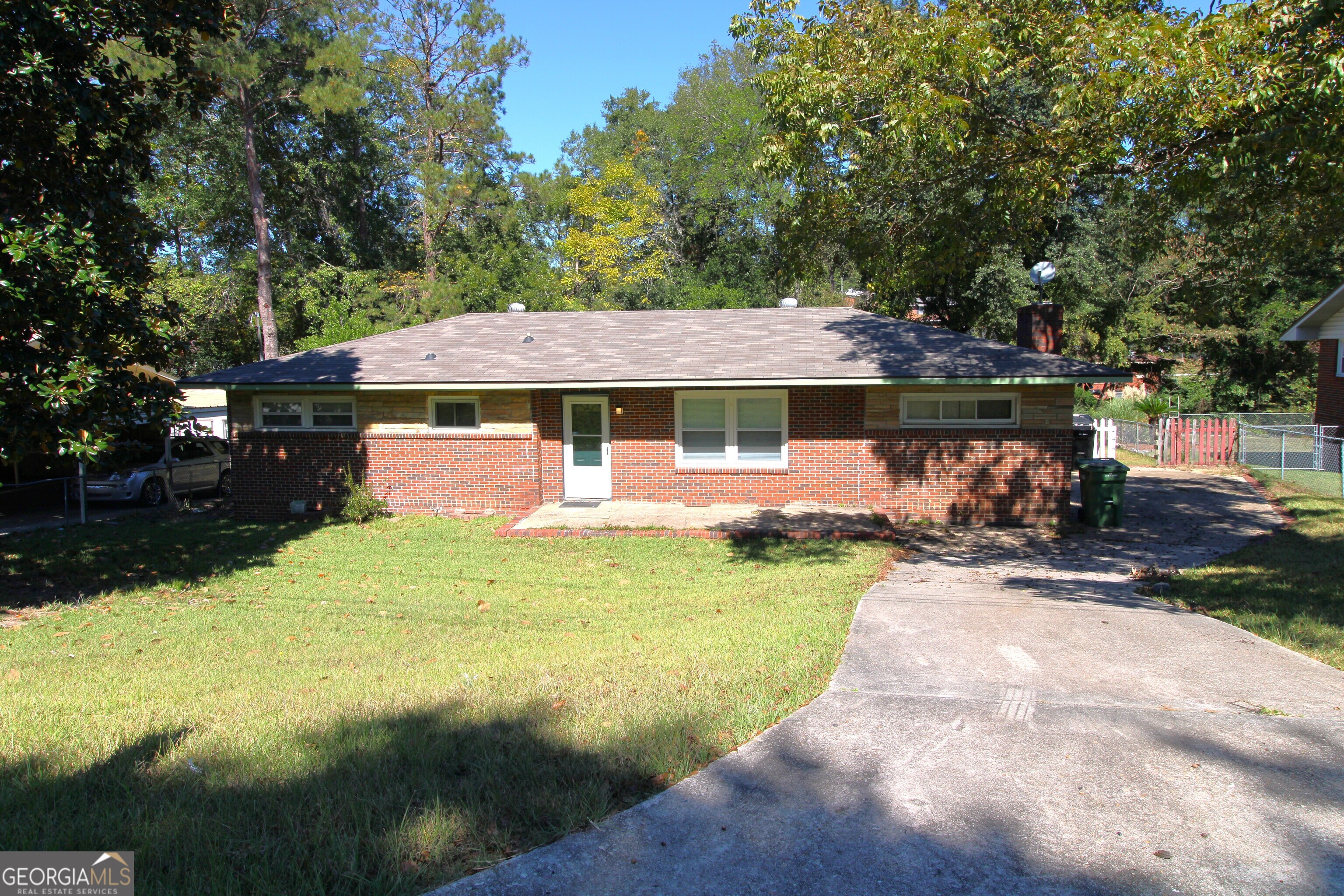 3589 Irwin Way Columbus, GA 31906 - Photo 1 of 25 a view of a house with garden and a patio