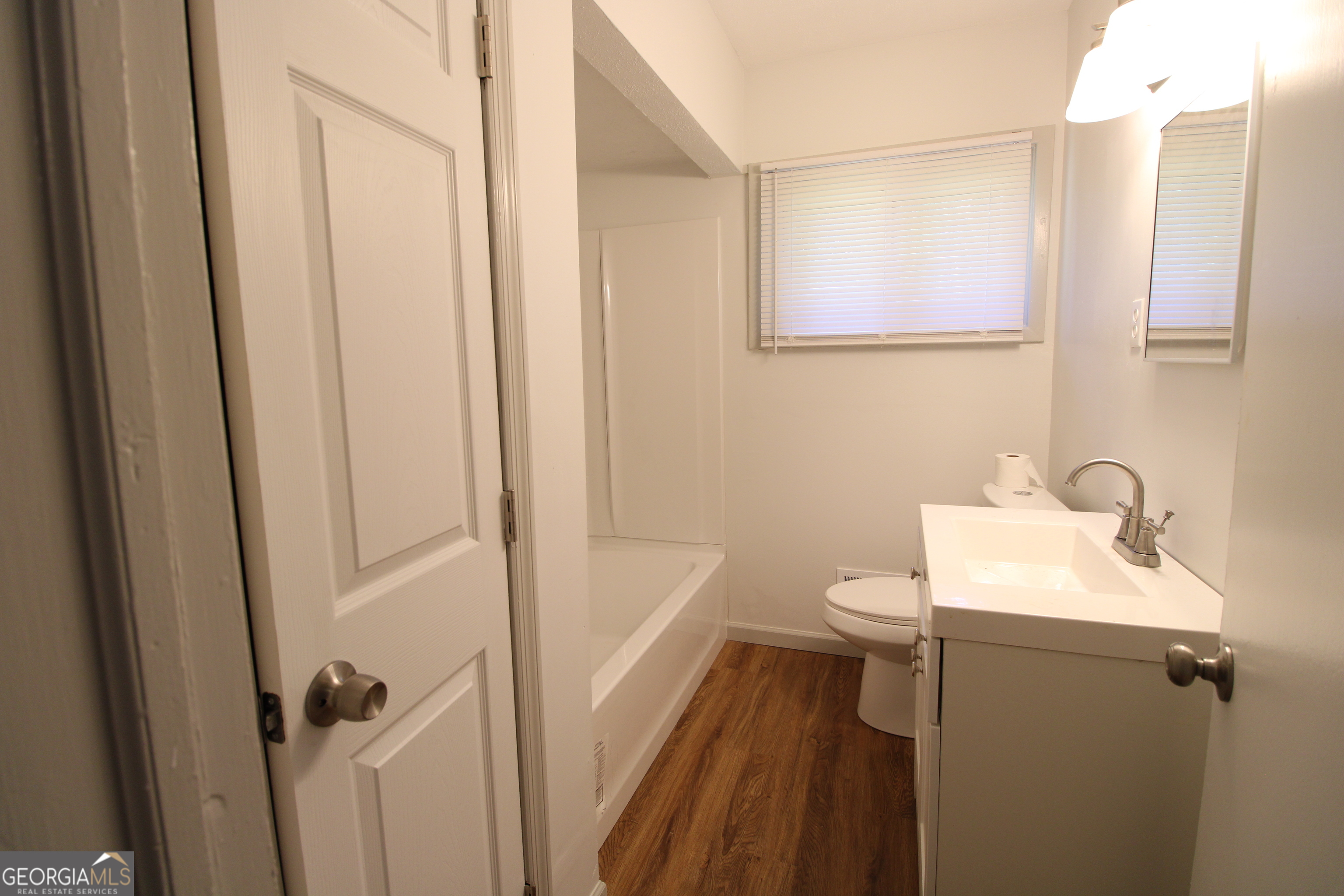3589 Irwin Way Columbus, GA 31906 - Photo 18 of 25 a bathroom with a sink a toilet and shower