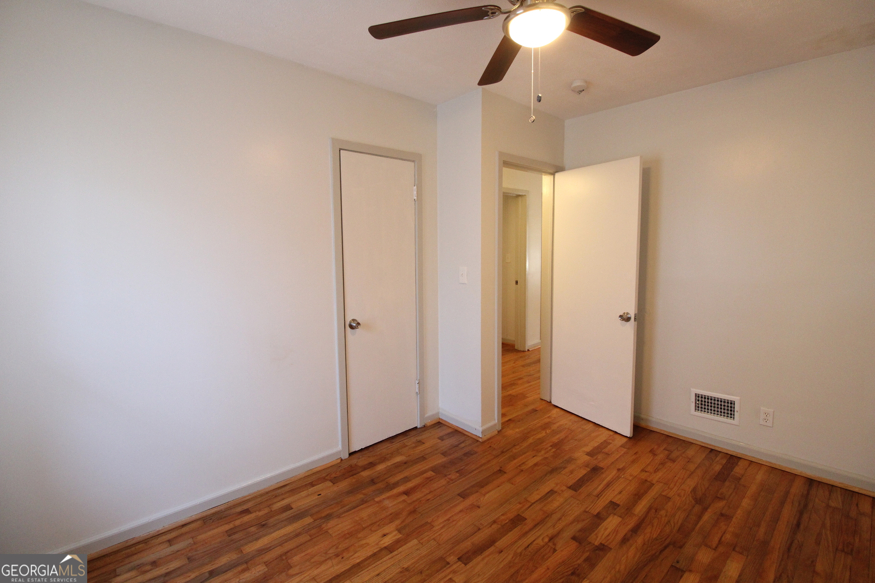 3589 Irwin Way Columbus, GA 31906 - Photo 20 of 25 a view of empty room with wooden floor