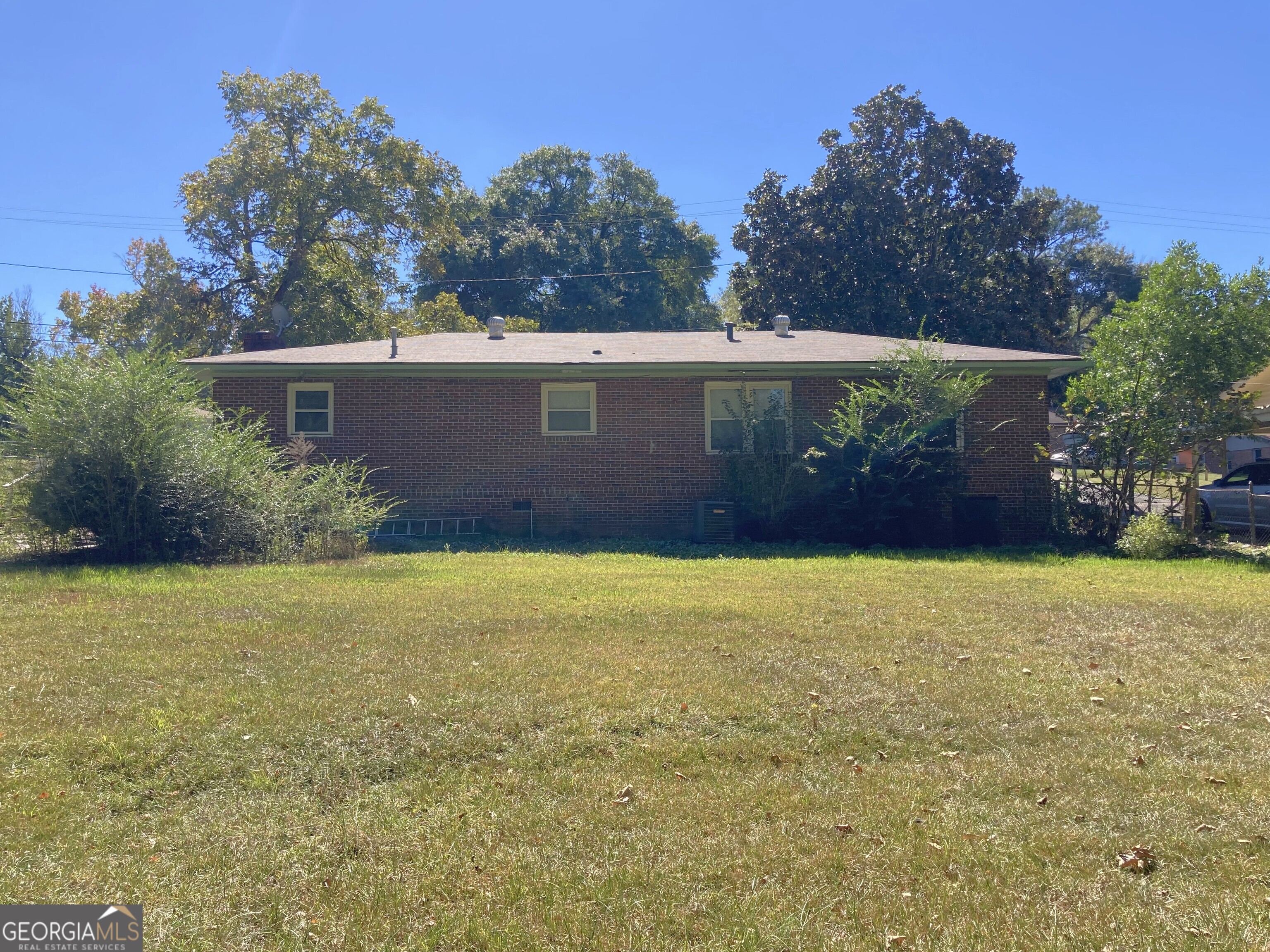 3589 Irwin Way Columbus, GA 31906 - Photo 22 of 25 front view of house next to a yard