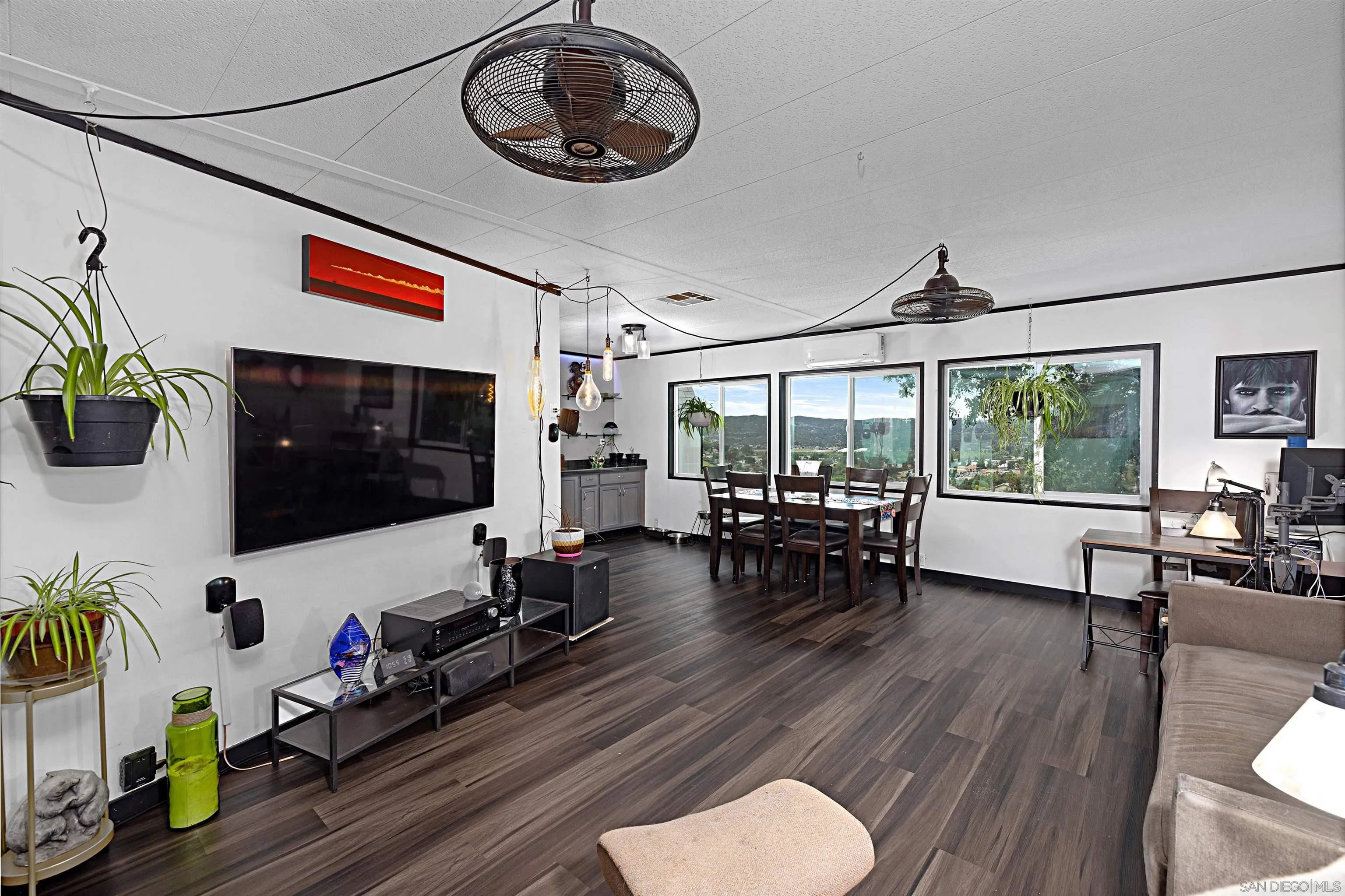 9100 Single Oak Drive, Unit 24 Lakeside, CA 92040 - Photo 12 of 48 a living room with furniture and a flat screen tv