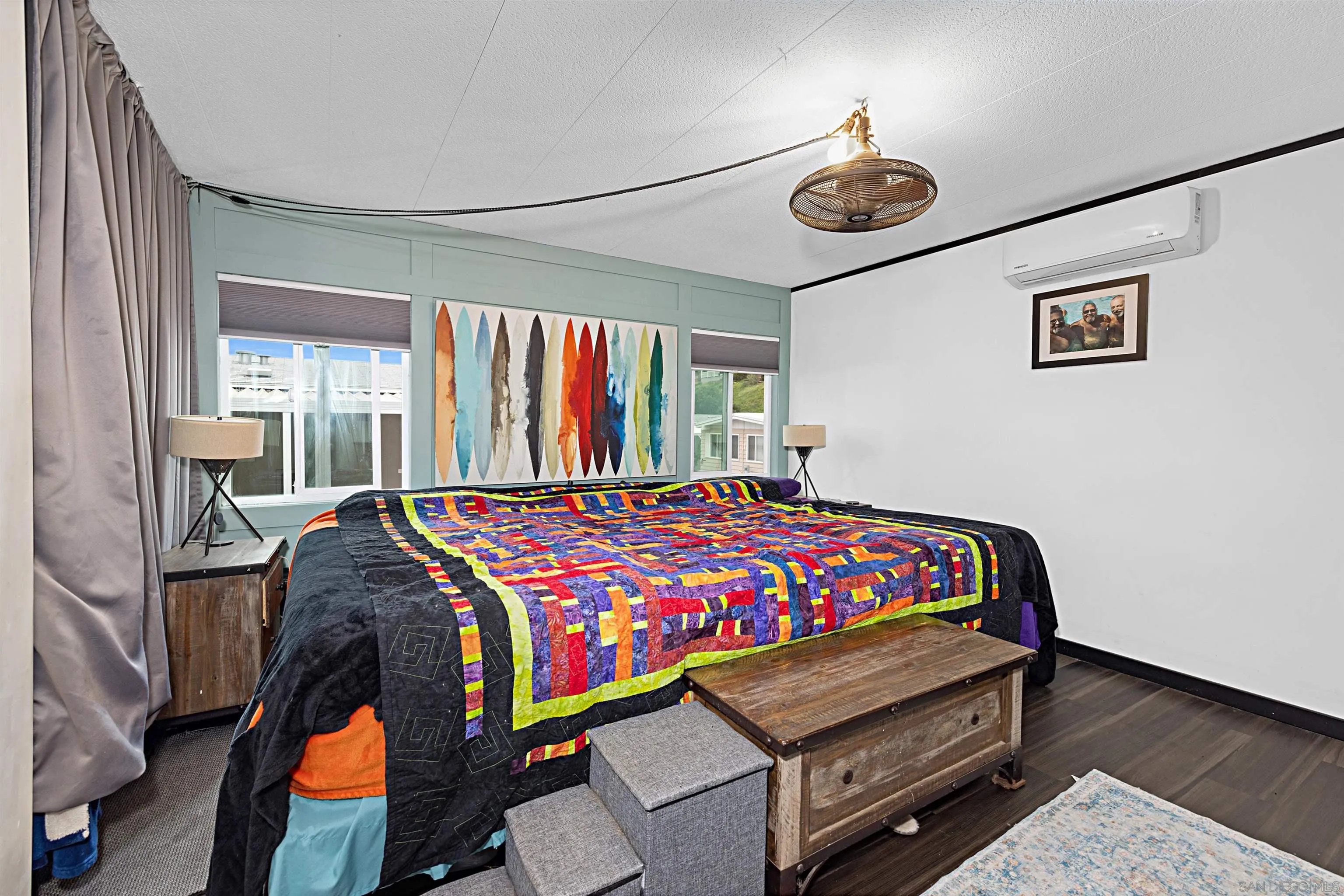 9100 Single Oak Drive, Unit 24 Lakeside, CA 92040 - Photo 15 of 48 a bedroom with a bed and window