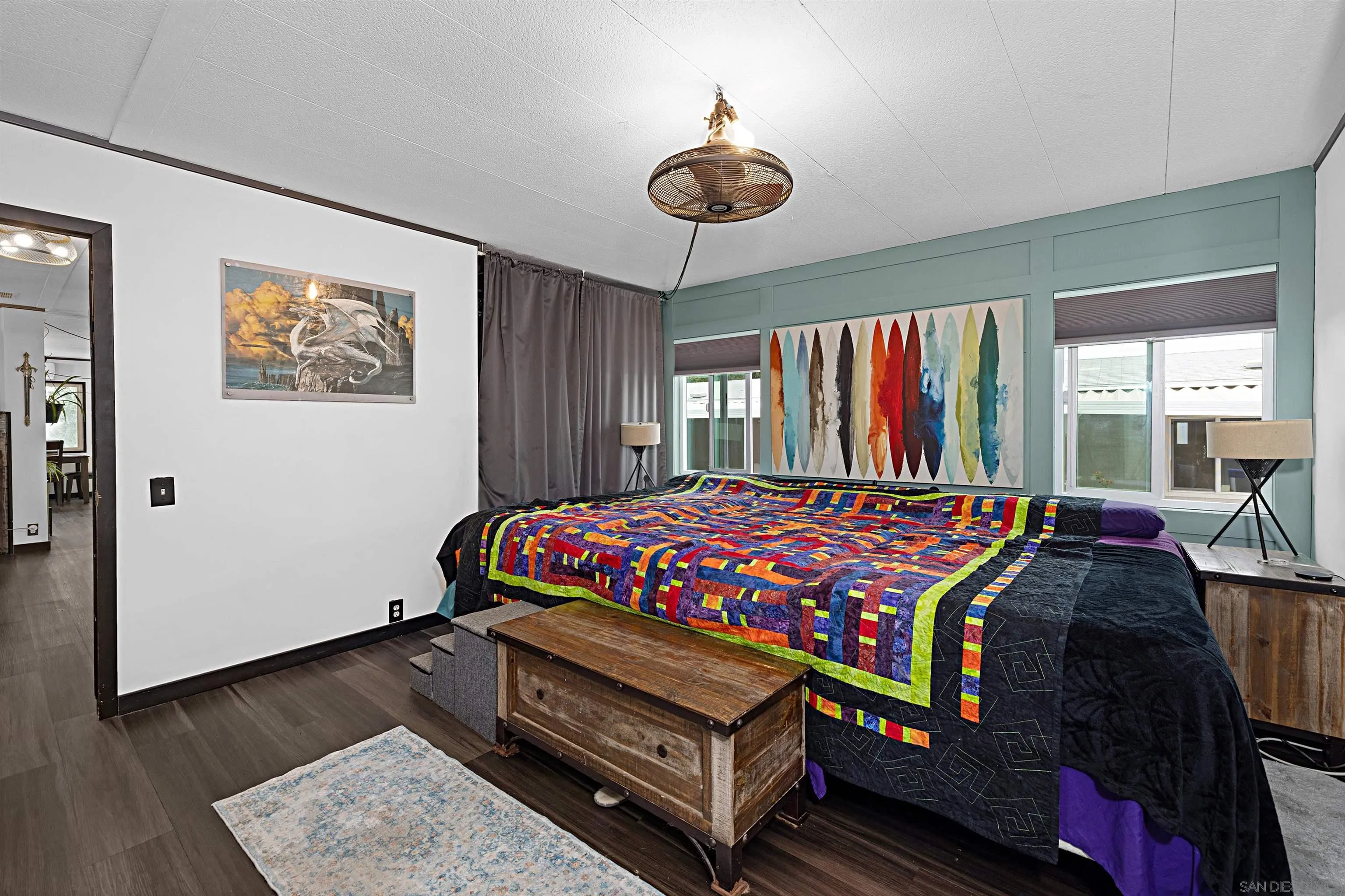 9100 Single Oak Drive, Unit 24 Lakeside, CA 92040 - Photo 16 of 48 a bed sitting in a bedroom next to a window