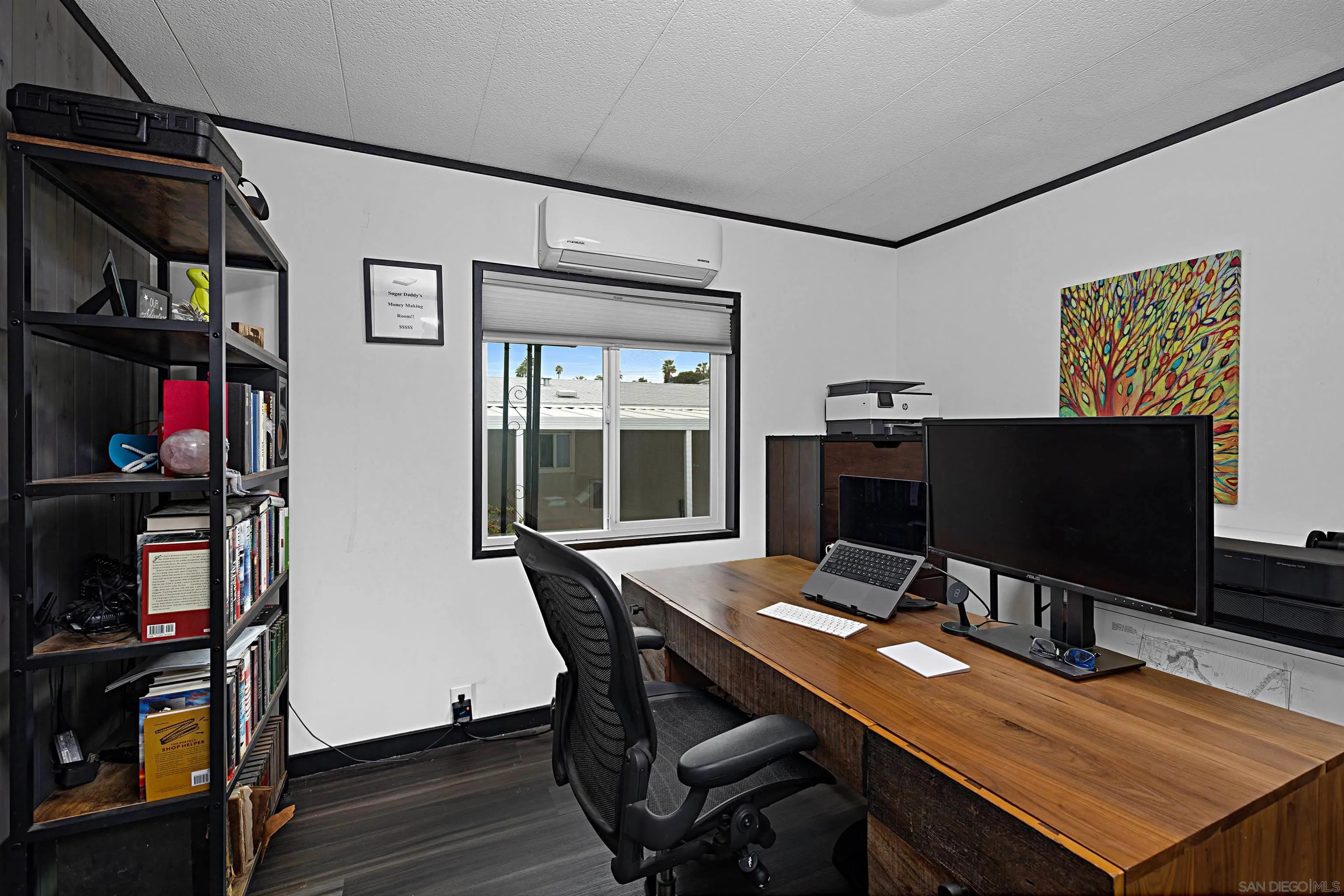 9100 Single Oak Drive, Unit 24 Lakeside, CA 92040 - Photo 21 of 48 a view of a workspace with furniture and wooden floor