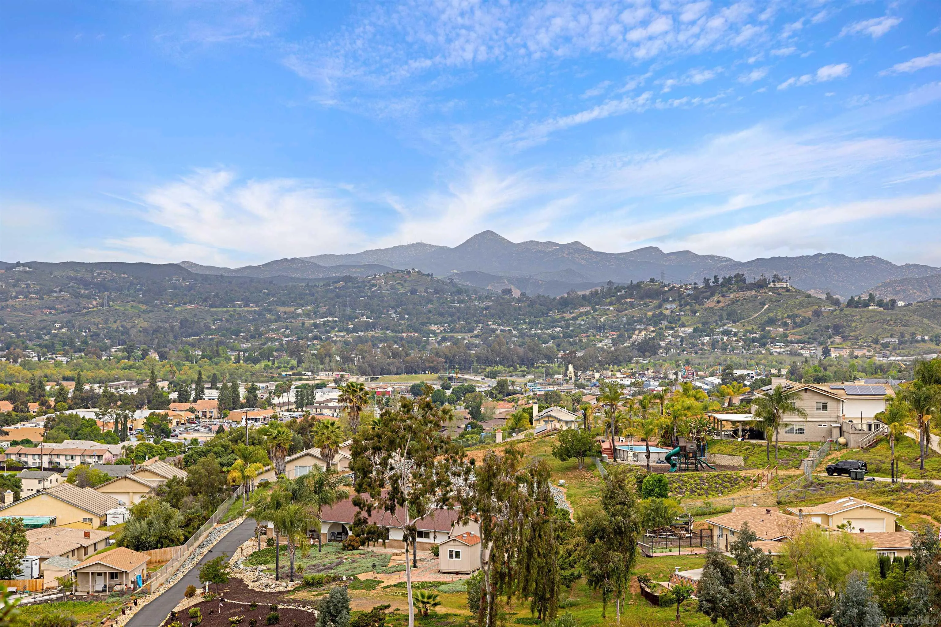 9100 Single Oak Drive, Unit 24 Lakeside, CA 92040 - Photo 30 of 48 an aerial view of residential houses with outdoor space and trees