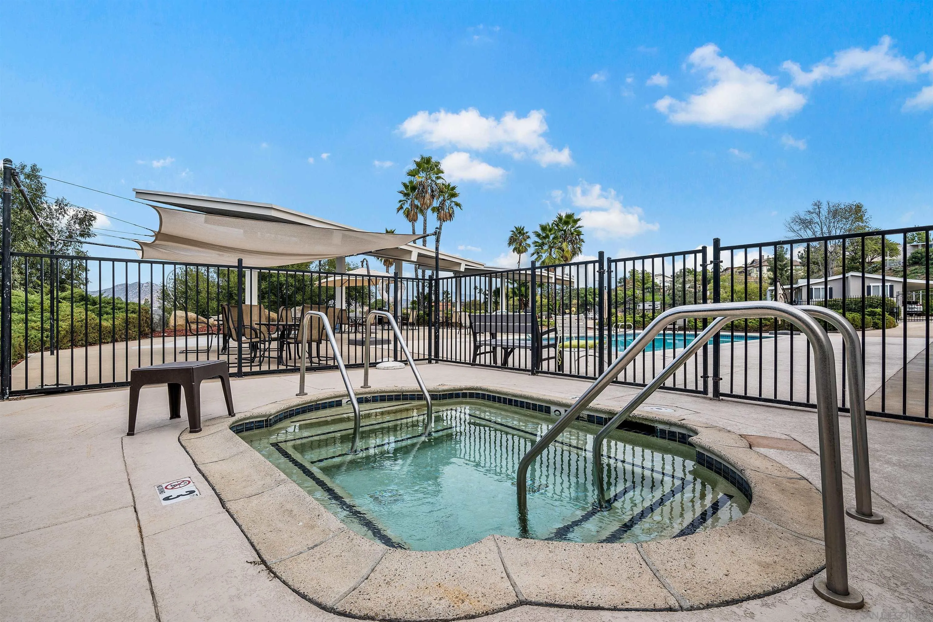 9100 Single Oak Drive, Unit 24 Lakeside, CA 92040 - Photo 39 of 48 a view of a balcony with swimming pool