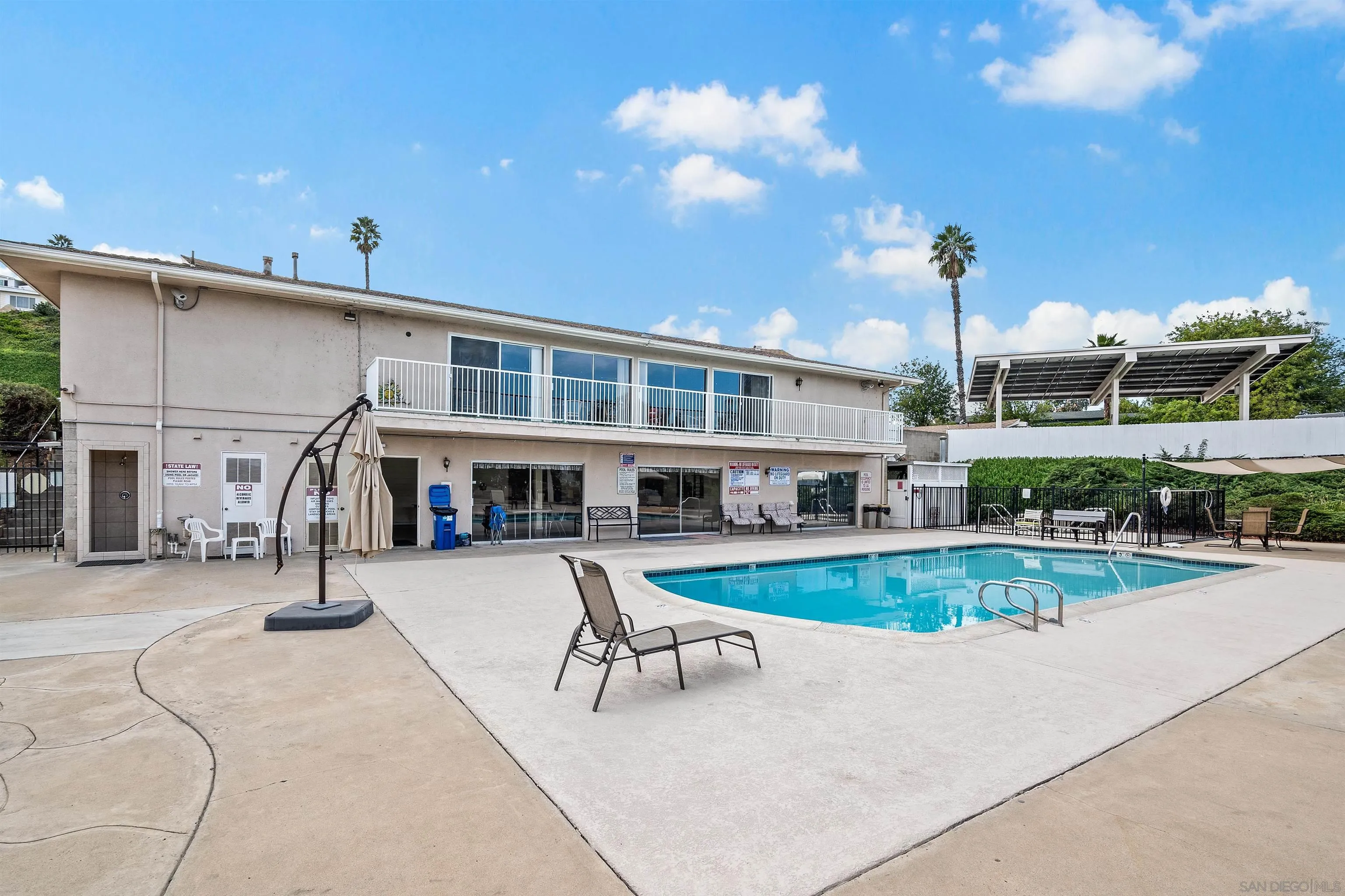 9100 Single Oak Drive, Unit 24 Lakeside, CA 92040 - Photo 42 of 48 a view of a house with pool porch and sitting area