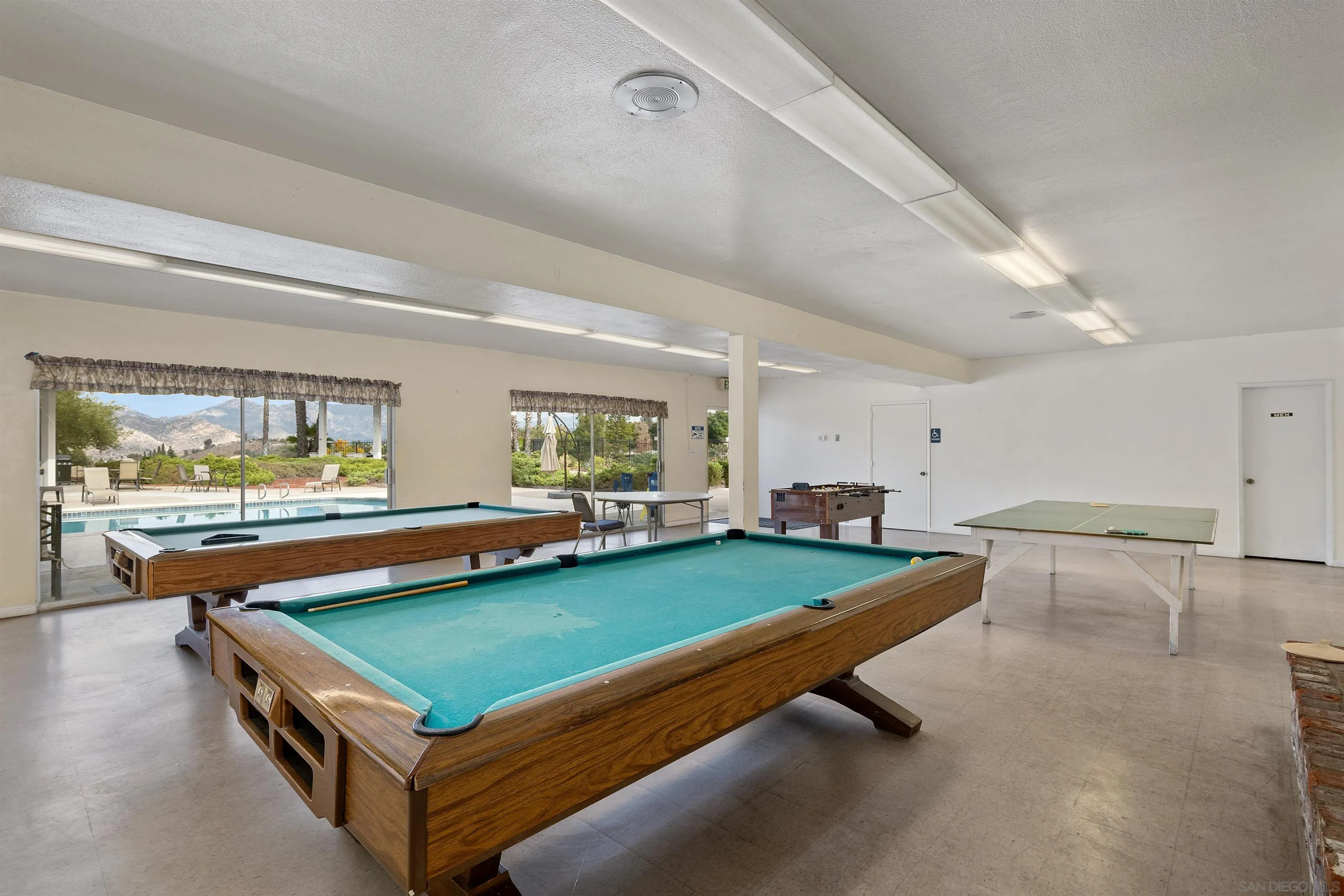 9100 Single Oak Drive, Unit 24 Lakeside, CA 92040 - Photo 45 of 48 a room with pool table and windows