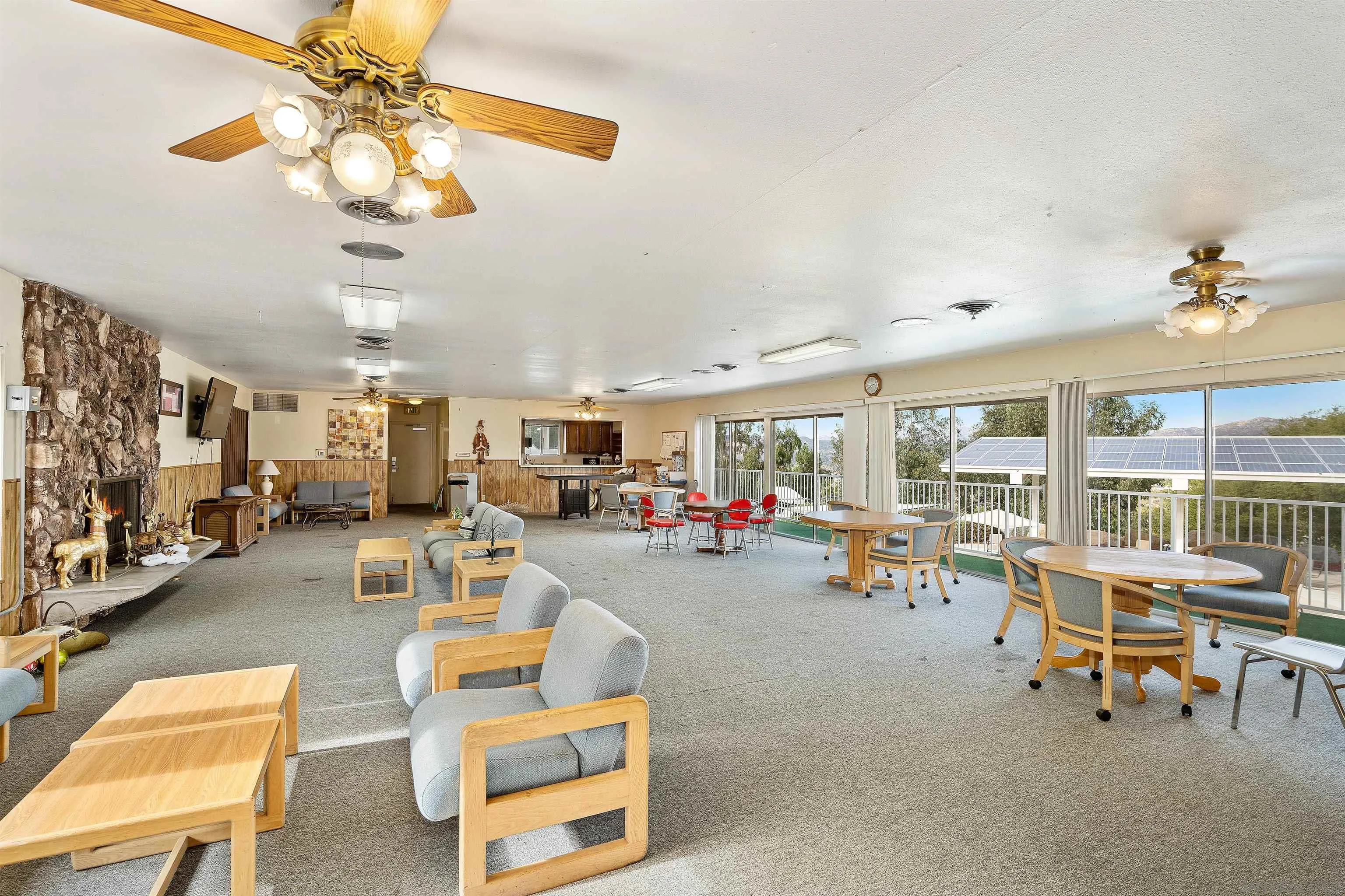 9100 Single Oak Drive, Unit 24 Lakeside, CA 92040 - Photo 46 of 48 a view of a livingroom with furniture and a ceiling fan
